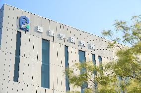 Exterior, logo, and sign of the RIKEN Center for Computational Science, a National Research and Development Agency